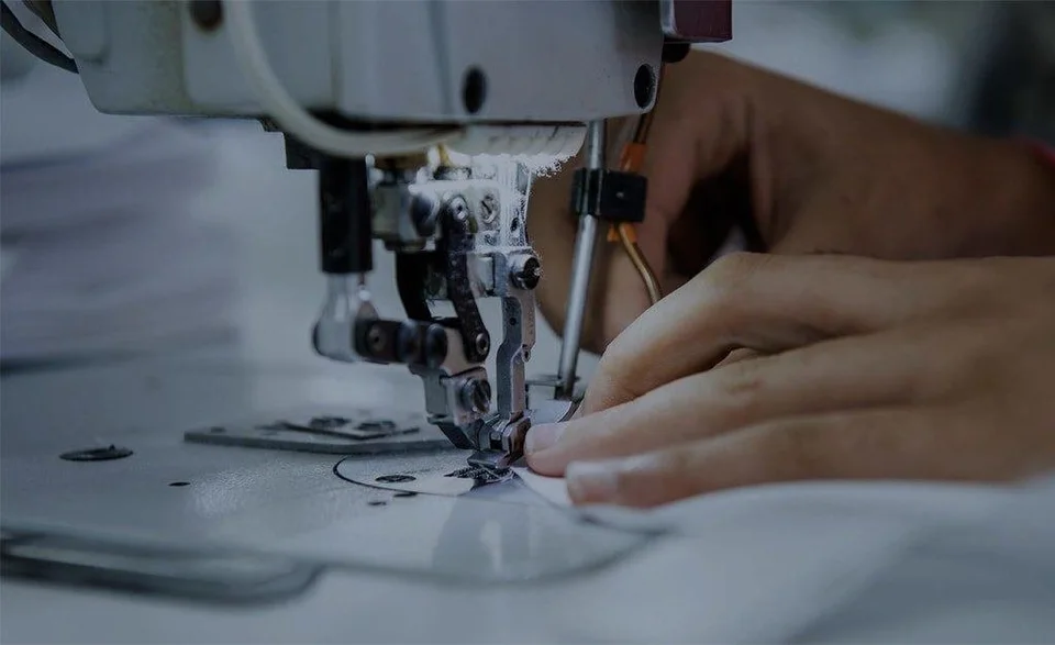 Garment stitching and fabric handling in close-up